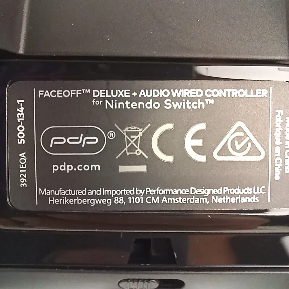 PDP Faceoff Deluxe + Audio Wired Controller For Nintendo Switch Multicolor